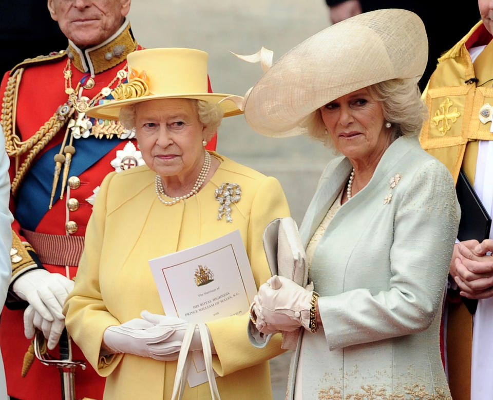 LONDON, ENGLAND - APRIL 29:  (L-R)  C Queen Elizabeth II and Camilla, Duchess of Cornwall exit the Royal Wedding of Prince William to Catherine Middleton at Westminster Abbey on April 29, 2011 in London, England.  The marriage of the second in line to the British throne is to be led by the Archbishop of Canterbury and will be attended by 1900 guests, including foreign Royal family members and heads of state.  Thousands of well-wishers from around the world have also flocked to London to witness the spectacle and pageantry of the Royal Wedding.  (Photo by Ian Gavan/GP/Getty Images)