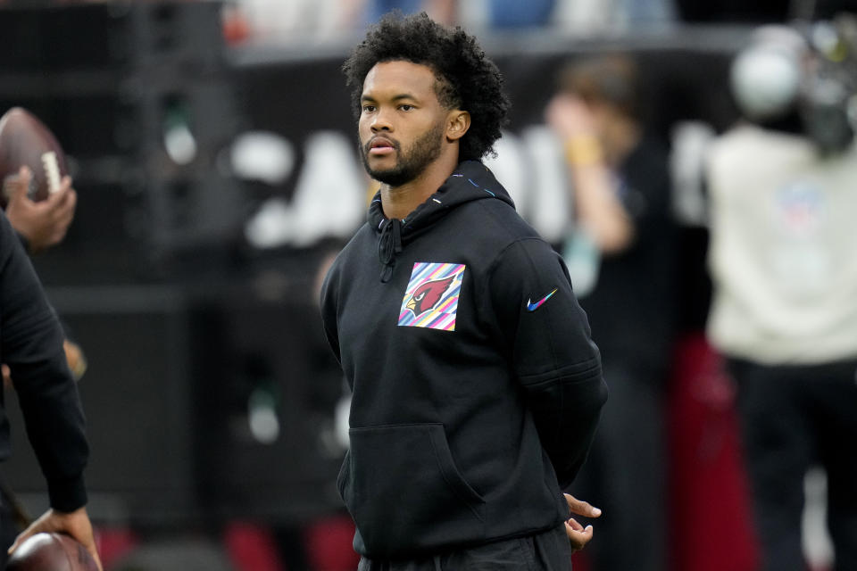 Arizona Cardinals quarterback Kyler Murray watches warm ups prior to an NFL football game against the Cincinnati Bengals, Sunday, Oct. 8, 2023, in Glendale, Ariz. (AP Photo/Ross D. Franklin)