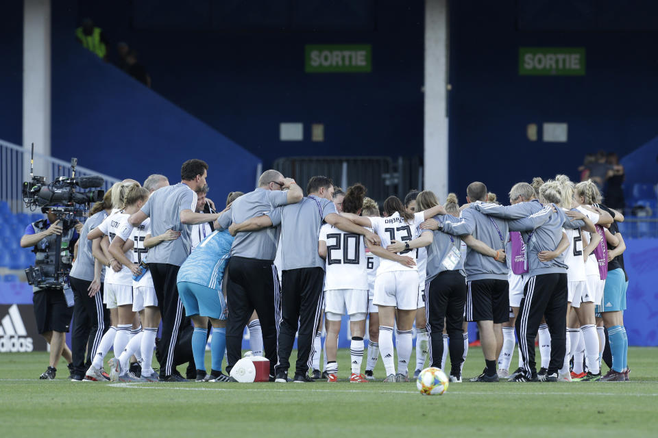 Germany team gather at the end of the Women's World Cup Group B soccer match between South Africa and Germany at the Stade de la Mosson in Montpellier, France, Monday, June 17, 2019. (AP Photo/Claude Paris)