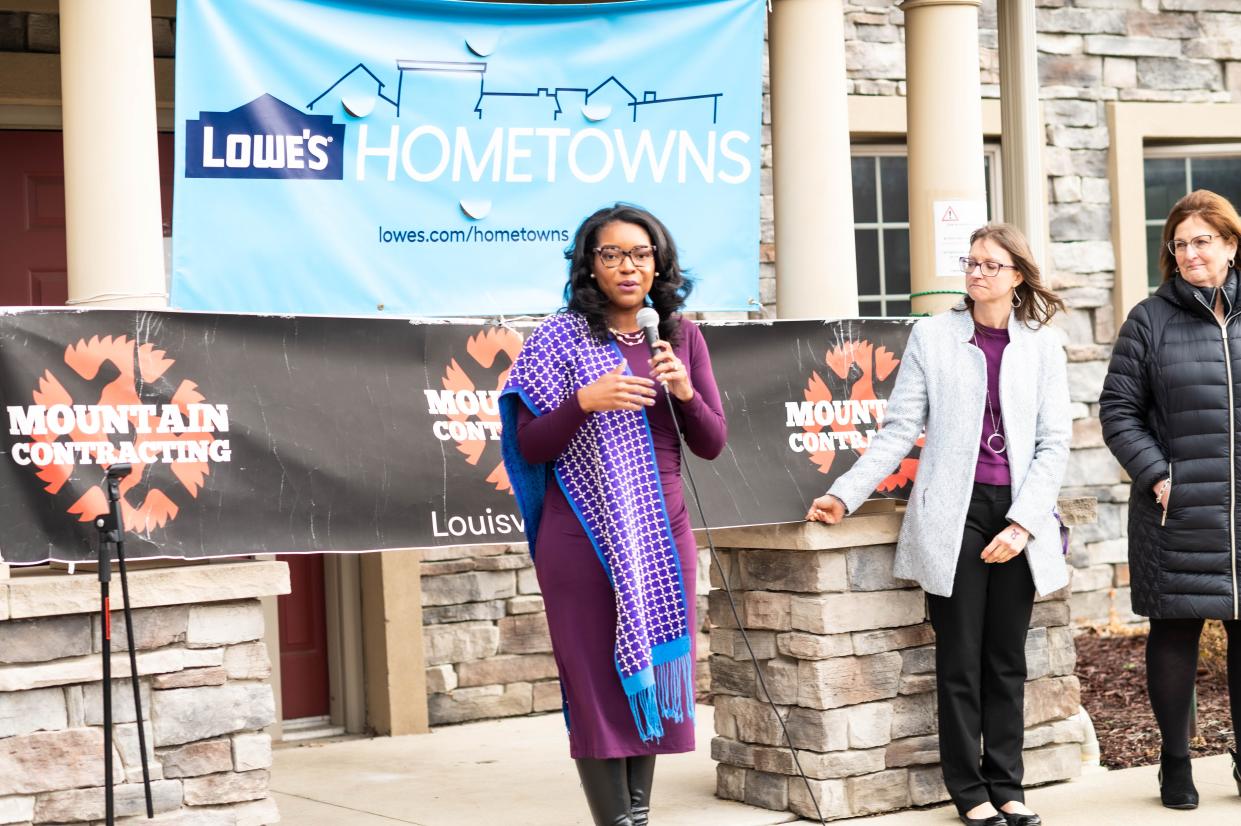 U.S. Rep. Emilia Sykes, D-Akron, presents the Domestic Violence Project Inc. in Canton with a congressional citation for its community service.