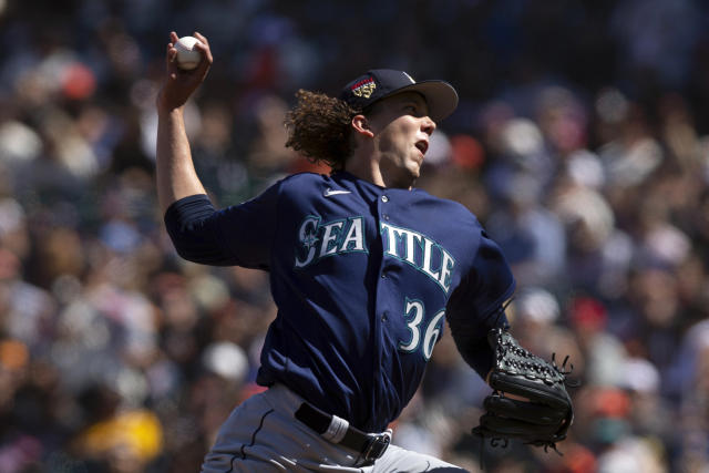 Los Angeles Angels' Logan O'Hoppe is given a kabuto after hitting a solo  home run off Seattle Mariners starting pitcher Logan Gilbert during the  fourth inning of a baseball game Monday, Sept.