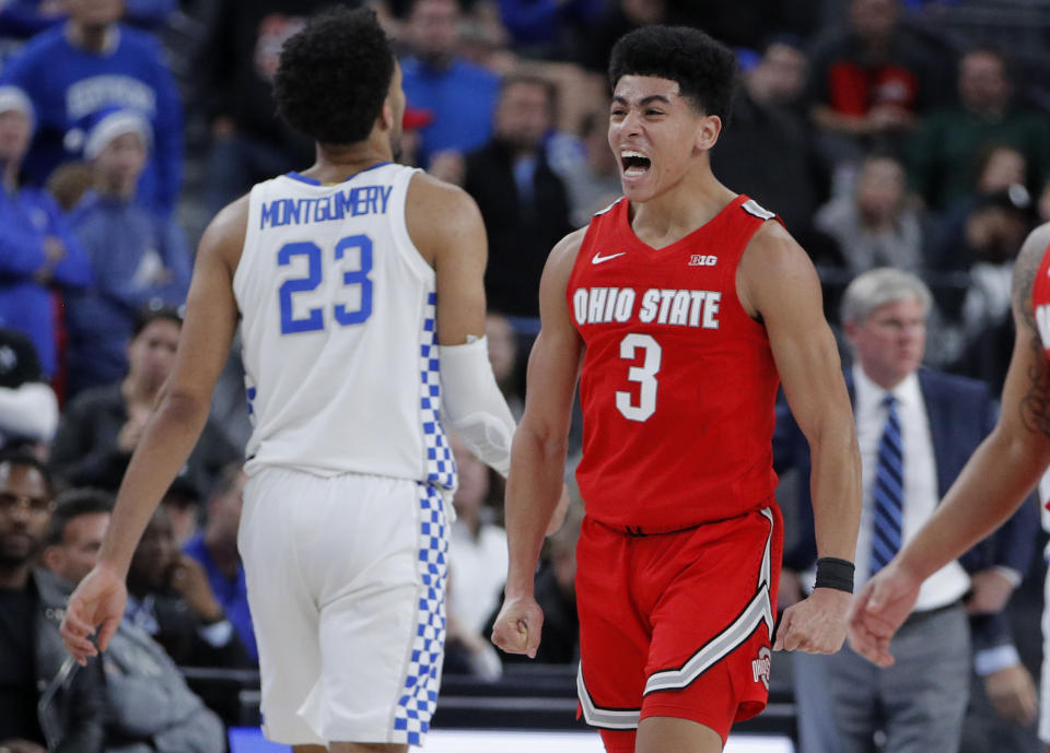 Ohio State's D.J. Carton (3) celebrates after a play against Kentucky during the second half of an NCAA college basketball game Saturday, Dec. 21, 2019, in Las Vegas. (AP Photo/John Locher)