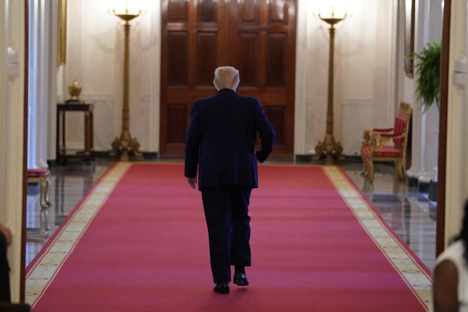 President Donald Trump departs after a roundtable with people positively impacted by law enforcement, Monday, July 13, 2020, in Washington. (AP Photo/Evan Vucci)