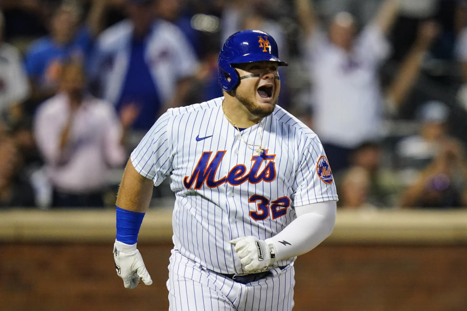New York Mets' Daniel Vogelbach watches his home run during the third inning of the team's baseball game against the Atlanta Braves on Thursday, Aug. 4, 2022, in New York. (AP Photo/Frank Franklin II)