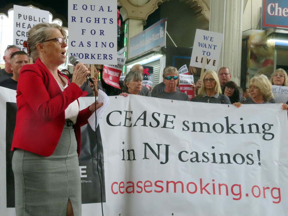 Cynthia Hallett, president of Americans for Nonsmokers' Rights, speaks at a protest outside the Hard Rock casino, Thursday, Sept. 22, 2022, in Atlantic City N.J., after New Jersey Gov. Phil Murphy spoke to a major casino industry conference. A bill that would ban smoking in casinos -virtually the only indoor workplace where it is allowed - is stalled in the New Jersey Legislature, even though Murphy has said he will sign it if it passes. (AP Photo/Wayne Parry)
