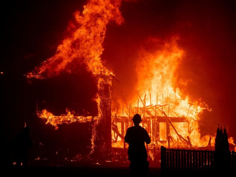 A utility company involved in the deadly wildfires that ravaged California last year has agreed to pay $1bn (£793.8bn) to cover damages across 14 local governments. The settlement is just a fraction of the more than $30bn (£23.8bn) in potential damages Pacific Gas & Electric is facing in lawsuits filed by local governments, insurance companies and private property owners, however. High winds knocking down some of the company's power lines during hot, dry weather were blamed for starting several of the state’s most destructive wildfires.More than half of the $1bn in the agreement would go to four local governments impacted by a 2018 fire that killed 85 people and destroyed nearly 14,000 homes in Northern California.Another $270m (£214.4m) would go towards the town of Paradise, which was mostly destroyed in the blaze. Paradise had 26,000 residents before the fire and now has less than 3,000 people. It has reportedly lost more than 90 per cent of its tax revenue.“There is some relief and hope in knowing that we will have some financial stability,” Lauren Gill, the town manager, said in a statement. “We can’t do disaster recovery and rebuild the town if we don’t have people to do it.”The settlement also covers a 2015 fire in Calaveras County and a series of 2017 fires in wine country.PG&E filed for bankruptcy earlier this year The agreement would resolve claims from some local governments, but it still must be approved by a bankruptcy court. That likely won’t happen until lawsuits by insurance companies and private property owners are resolved.A spokesperson for the utility described the settlement as “an important first step [towards] an orderly, fair and expeditious resolution of wildfire claims.”Additional reporting by AP