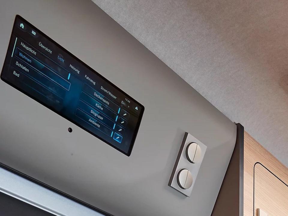 The smart home system near the ceiling of the van.