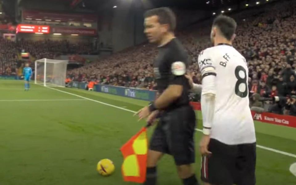 Bruno Fernandes pushes ref assistant during defeat to Liverpool at Anfield