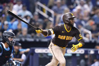 San Diego Padres' Jurickson Profar watches his RBI single during the fourth inning of the team'sp baseball game against the Miami Marlins, Thursday, July 22, 2021, in Miami. (AP Photo/Lynne Sladky)