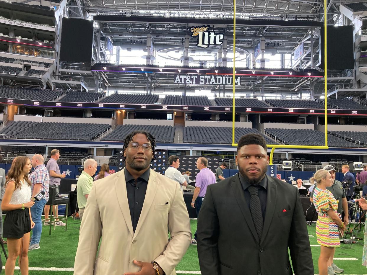 Jowon Briggs, left, and Dontay Corleone prepare to represent UC at Big 12 Media Days at AT&T Stadium last July.