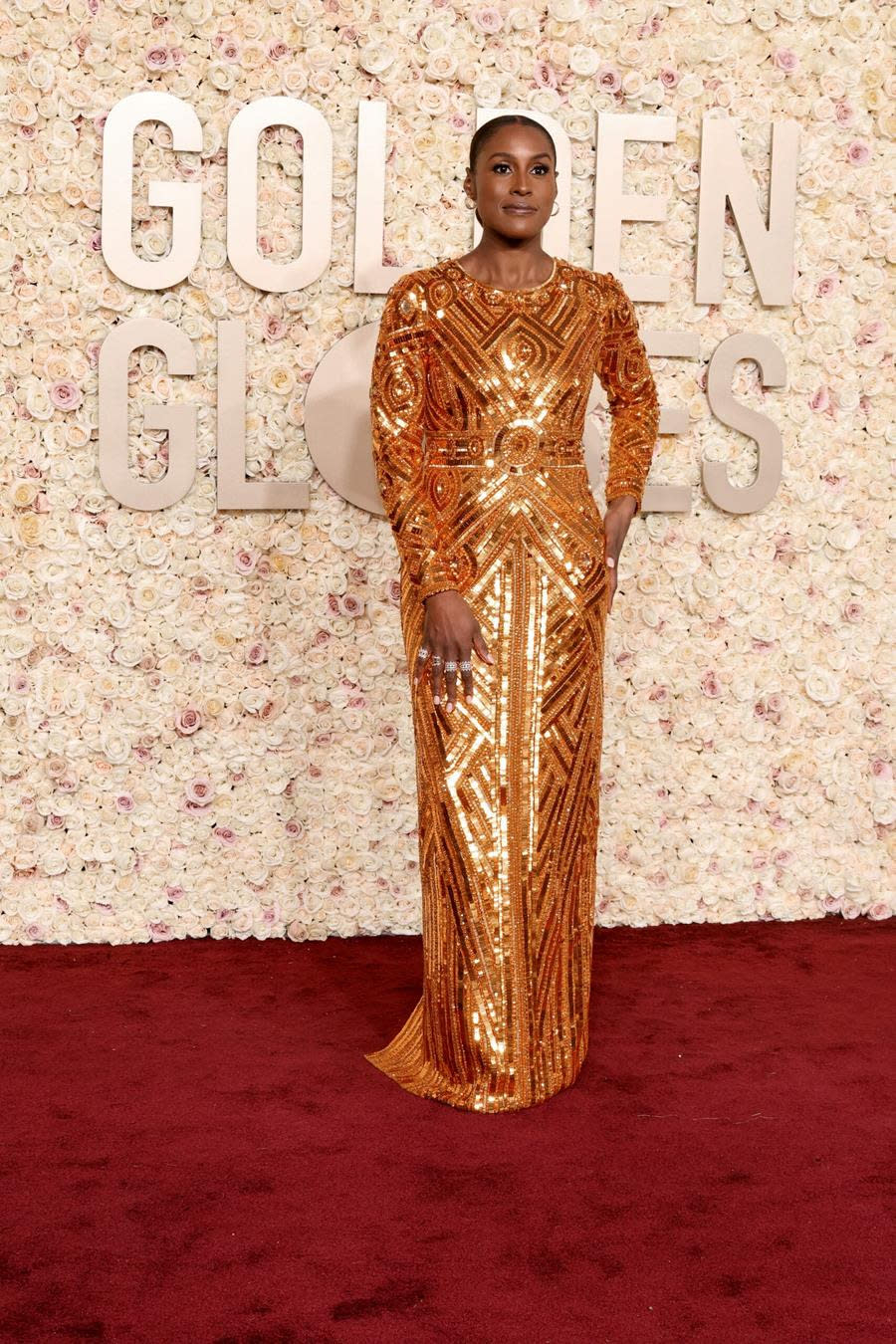 Issa Rae gets golden for the Globes, wearing an incredible Pamella Roland gown; her sky-high Rene Caovilla Cleo sandals were golden, too. (Amy Sussman/Getty Images)