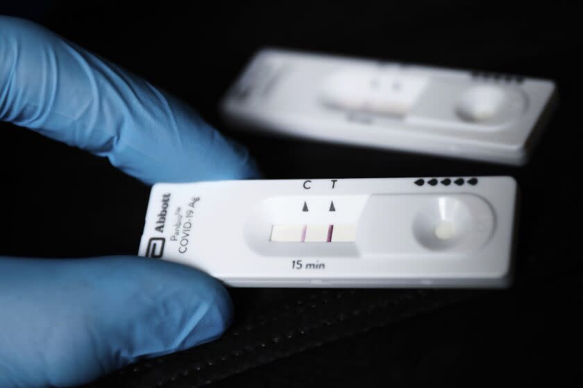 A positive result of rapid antigen test and a negative result of the test in the background