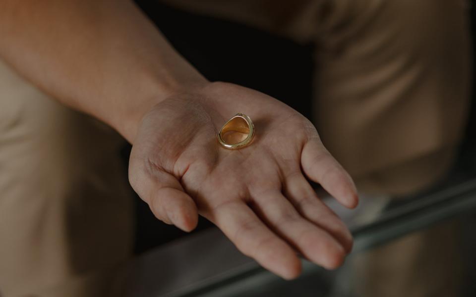 Jonathan Scott-Lee holds the ring in memory of his daughter