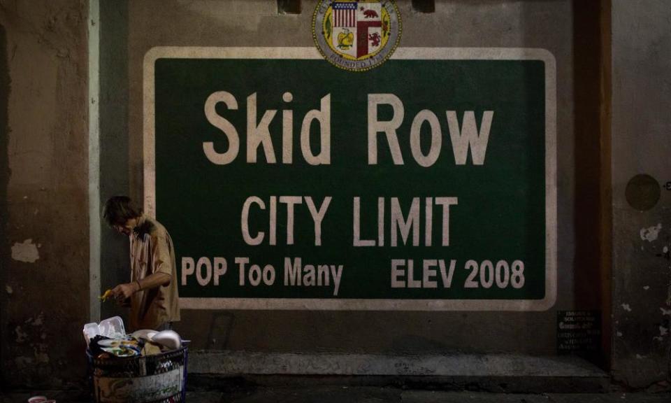 skid row sign says 'population: too many'