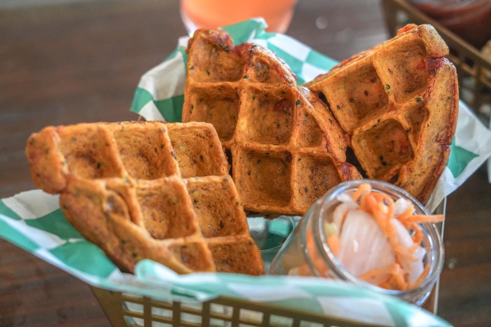 Waffles at Green Line Apothecary's The Fizz are made with cornmeal and fresh seltzer from their fountain.