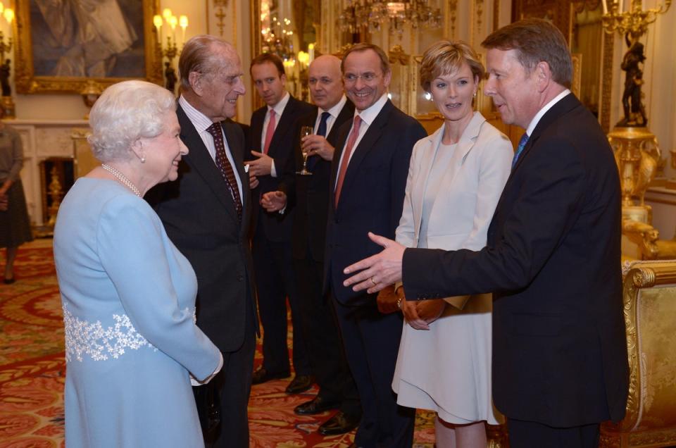 The Queen and the Duke of Edinburgh meeting Julie Etchingham and Bill Turnbull at Buckingham Palace in 2015 (Anthony Devlin/PA) (PA Archive)