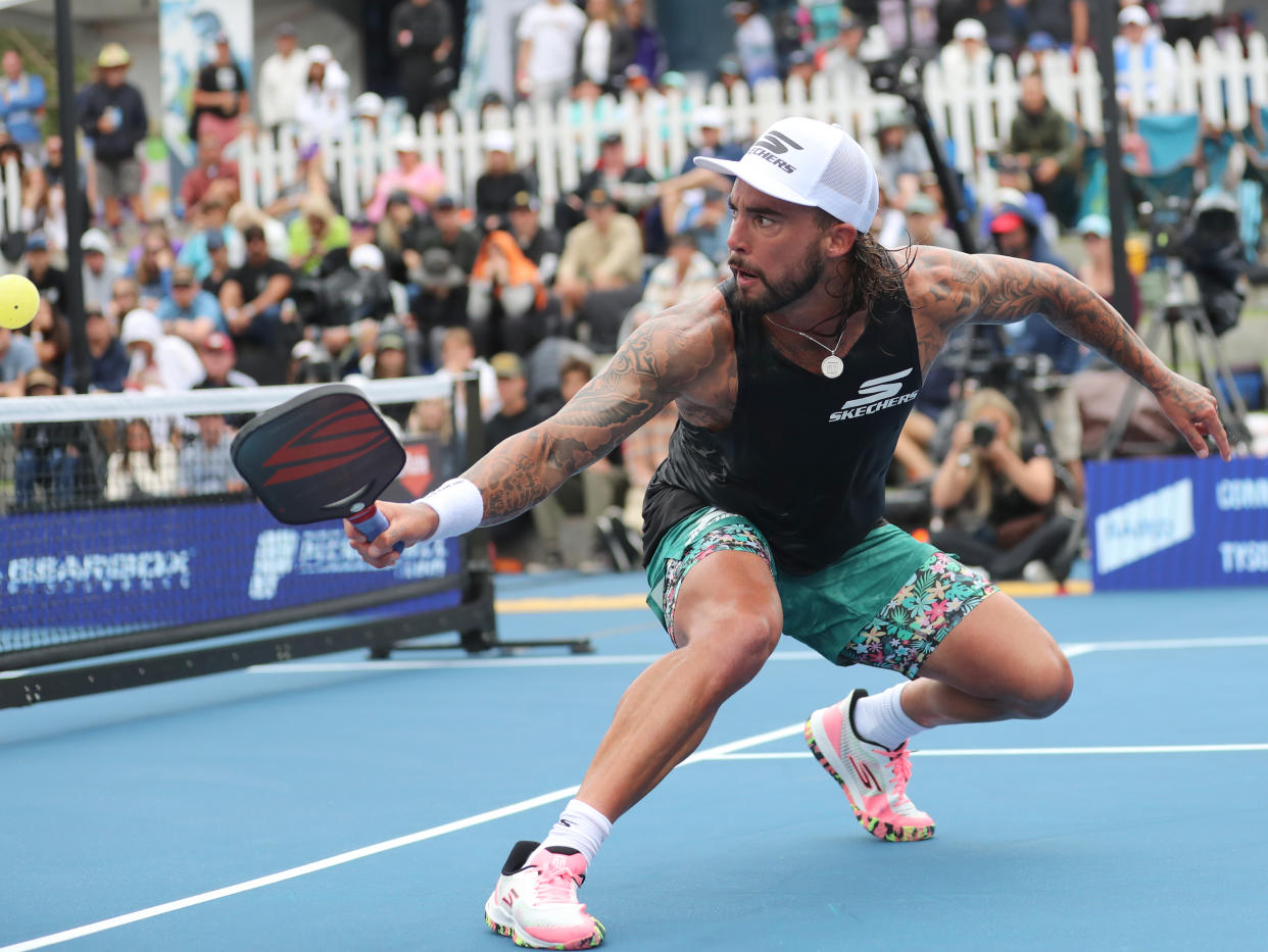 SAN CLEMENTE, CALIFORNIA - JUNE 11: Tyson McGuffin hits a backhand volley shot against Connor Garnett during the PPA Men's Singles Finals at Life Time Rancho San Clemente on June 11, 2023 in San Clemente, California. (Photo by Bruce Yeung/Getty Images)