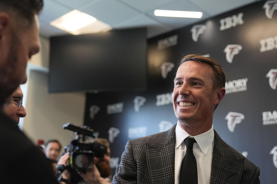 Former Atlanta Falcons quarterback Matt Ryan smiles after speaking about his retirement during a news conference Monday, April 22, 2024, in Flowery Branch, Ga. (AP Photo/Brynn Anderson)