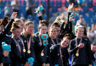 Hockey - Gold Coast 2018 Commonwealth Games - Gold Coast Hockey Centre - Gold Coast, Australia - April 14, 2018. Women's hockey gold medallists New Zealand celebrate with their Borobi plush dolls. REUTERS/David Gray