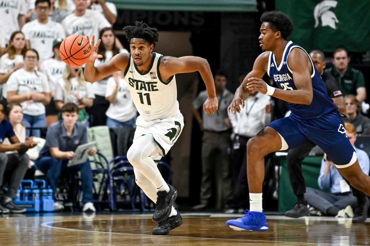Michigan State's A.J. Hoggard, left, takes off after stealing the ball from Georgia Southern's Avantae Parker during the second half on Tuesday, Nov. 28, 2023, at the Breslin Center in East Lansing.