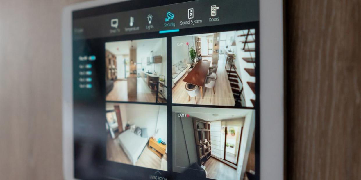 home security system using cameras to monitor the different rooms of the house   smart home concepts design on screen was made from scratch by us