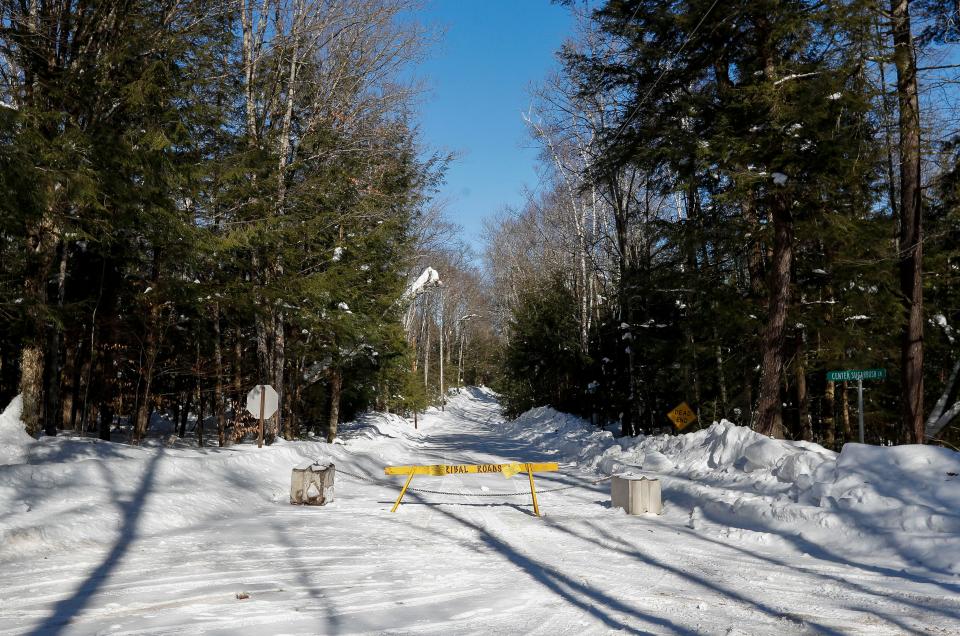 A roadblock is seen along Center Sugarbush Lane on Wednesday, February 8, 2023, at Lac du Flambeau town hall in Lac du Flambeau, Wis. A special town board meeting was held to receive public comment and deliberate over the town’s course of action in response to Lac du Flambeau reservation tribal officials erecting barricades along four roads in the area. Tribal officials set up barricades on the roads Jan. 30 after negotiations with property title companies that built the roads and the homes they access broke down. Tribal officials say the roads were illegally built on tribal lands and the tribe was not compensated for the right-of-way easements.Tork Mason/USA TODAY NETWORK-Wisconsin 