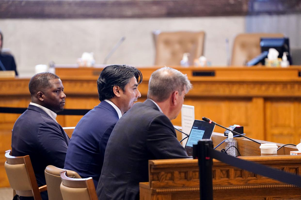 Cincinnati Mayor Aftab Purevel, center, addresses the Cincinnati Planning Commission as the body meets to hear public comment before voting on a zoning overhaul named Connected Communities, Friday, May 17, 2024, at City Hall in Cincinnati. Pureval is joined by Councilman Reggie Harris, left, and Councilman Jeff Cramerding, right.