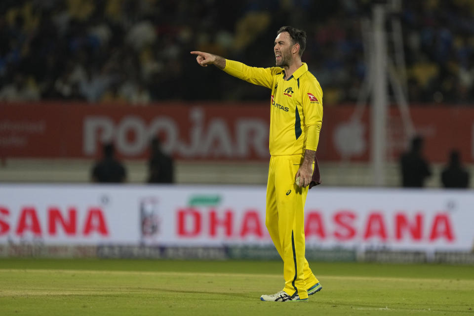 Australia's Glenn Maxwell gestures before bowling a delivery during the third one day international cricket match between Australia and India in Rajkot, India, Wednesday, Sept. 27, 2023. (AP Photo/Ajit Solanki)