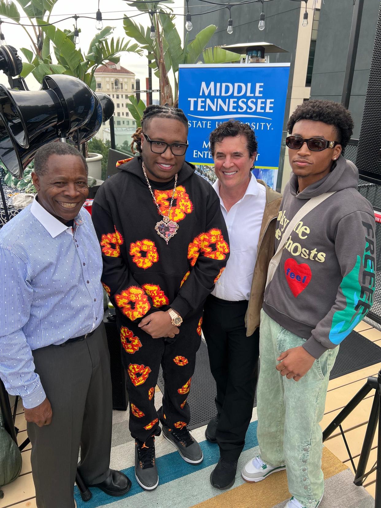 From left, Middle Tennessee State University President Sidney A. McPhee; Grammy-nominated alumnus Tay Keith; Big Machine Label Group CEO Scott Borchetta; and senior music business major Nicolas Edgerson are shown Feb. 3 at the university’s pre-Grammy brunch at Mama Shelter Hotel rooftop spot in Los Angeles. Edgerson was among several MTSU students who traveled with a university delegation to the Grammy Awards to celebrate successful alumni in the industry and network with artists and executives.
