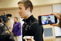 Minnesota State, Mankato defensive back Sam Thompson talks to reporters Thursday, April 17, 2014, in Mankato, Minn. Players ended their boycott of spring practice and said Thursday they will play for coach Todd Hoffner, who was reinstated after being exonerated of having child pornography on his cellphone. (AP Photo/Star Tribune, Jerry Holt) ST. PAUL OUT MINNEAPOLIS-AREA TV OUT MAGS OUT