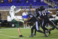 Charlotte's Connor Bowler (19) has his punt blocked blocked by Duke's Isaiah Fisher-Smith (11) during the first quarter of an NCAA college football game Saturday, Oct. 31, 2020, in Durham, N.C. (Jaylynn Nash/Pool Photo via AP)