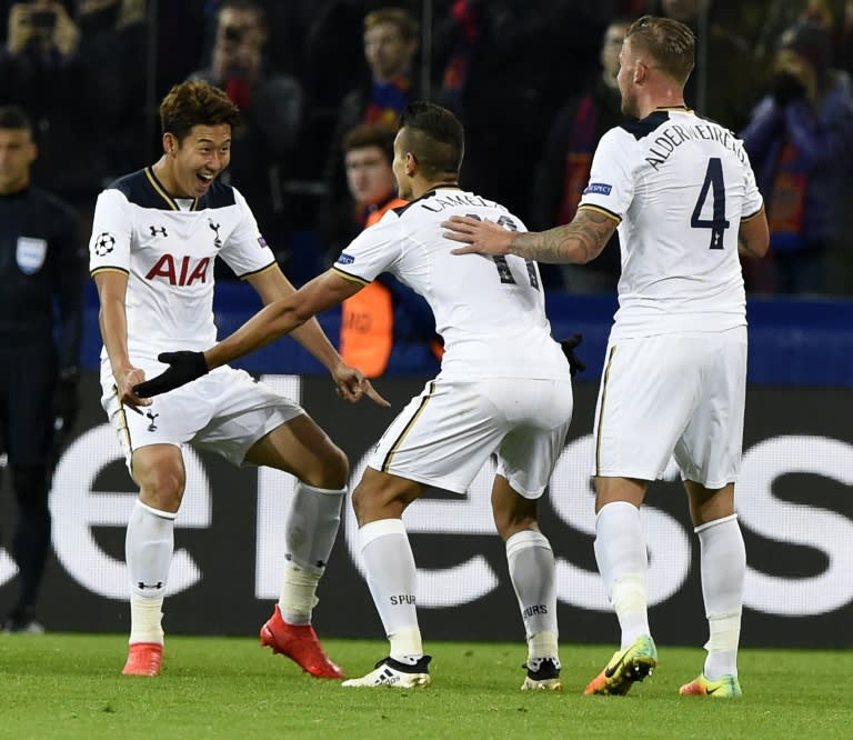 Tottenham Hotspur's Belgian defender Toby Alderweireld, midfielder Erik Lamela (C) and South Korean striker Son Heung-Min (L) celebrate their goal