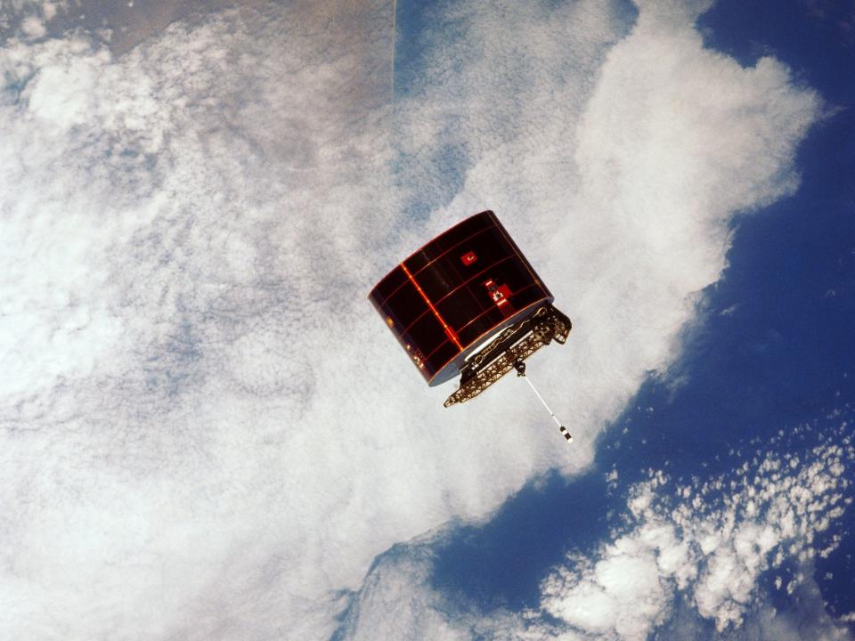 Syncom IV satellite orbiting Earth, pictured in 1984.