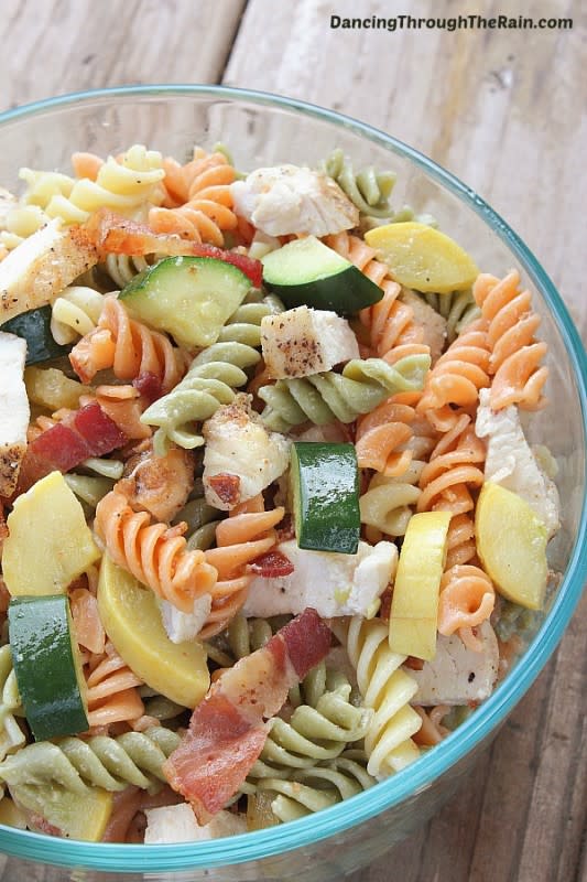 <p>Dancing Through the Rain</p><p>This Bacon Ranch Chicken Pasta Salad is the perfect side dish for spring! Bright and delicious, this can be served hot or cold depending on your preference!</p><p><strong>Get the recipe: </strong><a href="https://dancingthroughtherain.com/bacon-ranch-chicken-pasta/" rel="nofollow noopener" target="_blank" data-ylk="slk:Bacon Ranch Chicken Pasta;elm:context_link;itc:0;sec:content-canvas" class="link "><strong>Bacon Ranch Chicken Pasta</strong></a></p>