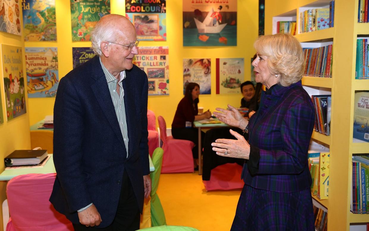 Peter Usborne with Camilla, Duchess of Cornwall, at the London Book Fair at Earls Court in 2014 - Tim P Whitby/Getty Images