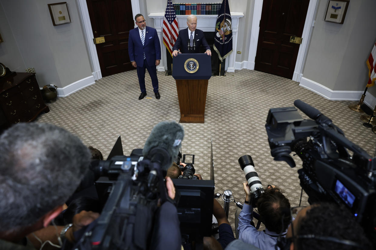 WASHINGTON, DC - JUNE 30: U.S. President Joe Biden is joined by Education Secretary Miguel Cardona (L) as he announces new actions to protect borrowers after the Supreme Court struck down his student loan forgiveness plan in the Roosevelt Room at the White House on June 30, 2023 in Washington, DC. In a 6-to-3 decision, the court ruled the loan forgiveness program -- which was projected to help 40 million people and cost $400 billion -- was unconstitutional.  (Photo by Chip Somodevilla/Getty Images)