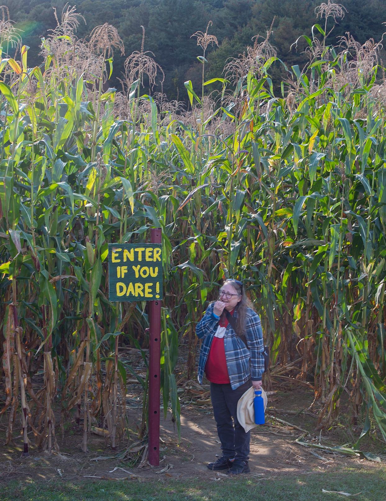 Suzette Holman, of Shirley, at the entrance to the corn maze at Hanson's Farm in Framingham, Oct. 12, 2023.