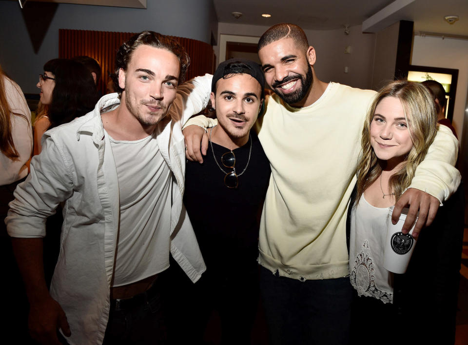 <p>Drake posed with 'Degrassi' co-stars Daniel Clark, Adamo Ruggiero and Lauren Collins at the screening of 'We Are Disorderly' held at the Royal Cinema on August 5, 2015 in Toronto, Canada. <a href="http://www.huffingtonpost.com/entry/drake-had-degrassi-reunion_55c38516e4b0f1cbf1e3f402">It was amazing</a>.&nbsp;</p>
