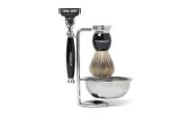 <p>This stunning shave kit is practical, and will certainly add glamor to any vanity or countertop. D R Harris’ gift set comes with a razor, lathering bowl, badger-hair brush, and brush stand, all in sleek black and chrome. It’s a great option for the guy who seemingly has everything.</p> <p>To buy: <a rel="nofollow noopener" href="http://click.linksynergy.com/fs-bin/click?id=93xLBvPhAeE&subid=0&offerid=476536.1&type=10&tmpid=14422&RD_PARM1=https%3A%2F%2Fwww.mrporter.com%2Fen-us%2Fmens%2Fd_r_harris%2Febony-shaving-set%2F659026&u1=TLTRVGGValentinesDayGiftsAD1Jan17" target="_blank" data-ylk="slk:mrporter.com;elm:context_link;itc:0;sec:content-canvas" class="link ">mrporter.com</a>, $395</p>