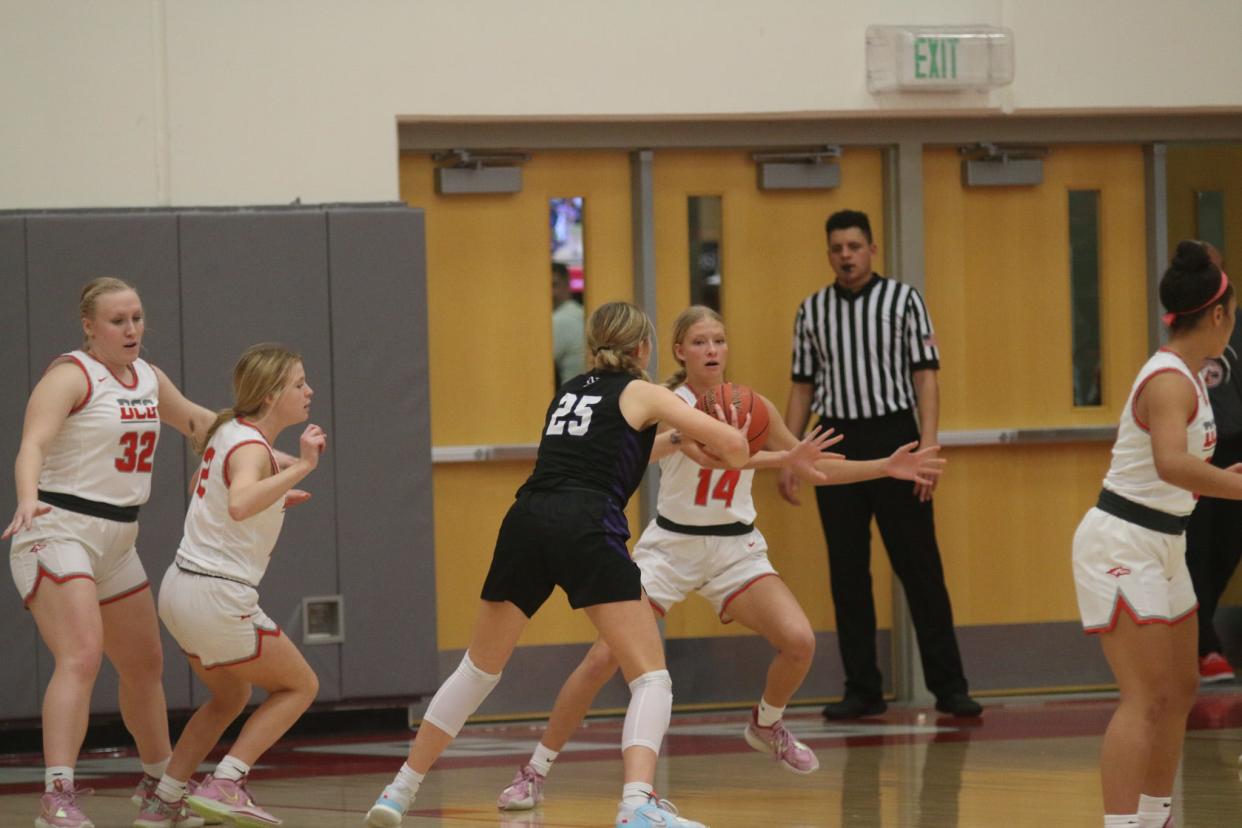 DCG's Jenna Morrison defends a Norwalk player on Tuesday, Jan. 31, 2023, in Grimes.