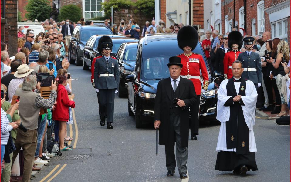 Dame Vera Lynn's funeral cortege passes through the village of Ditchling - PA