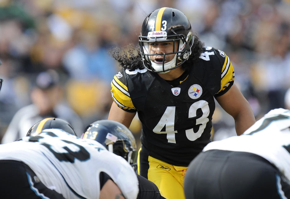FILE - In this Saturday, Oct. 16, 2011, file photo, Pittsburgh Steelers strong safety Troy Polamalu (43) lines up against the Jacksonville Jaguars during the second quarter of a football game in Pittsburgh. His long hair — a tribute to his Samoan roots — spilling out from under his helmet onto the top of his No. 43 jersey, Polamalu careened from one side of the field to the next for 12 seasons in Pittsburgh. (AP Photo/Don Wright, File)