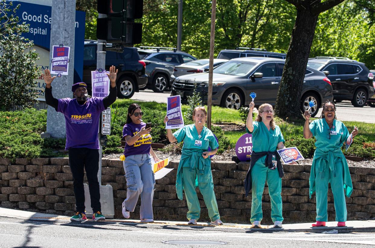 Health care workers at Good Samaritan Hospital in Suffern stand on route 59 outside the hospital May 7, 2024 as they protest layoffs that Bon Secours Charity Health System, which includes Good Samaritan, were hit with recently. About 50 workers at various Bon Secours hospitals in the Hudson Valley were laid off.