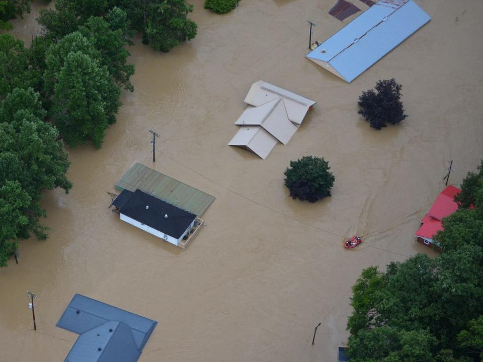 National Guard members aid in flood relief efforts July 30 in response to a state of emergency in eastern Kentucky.