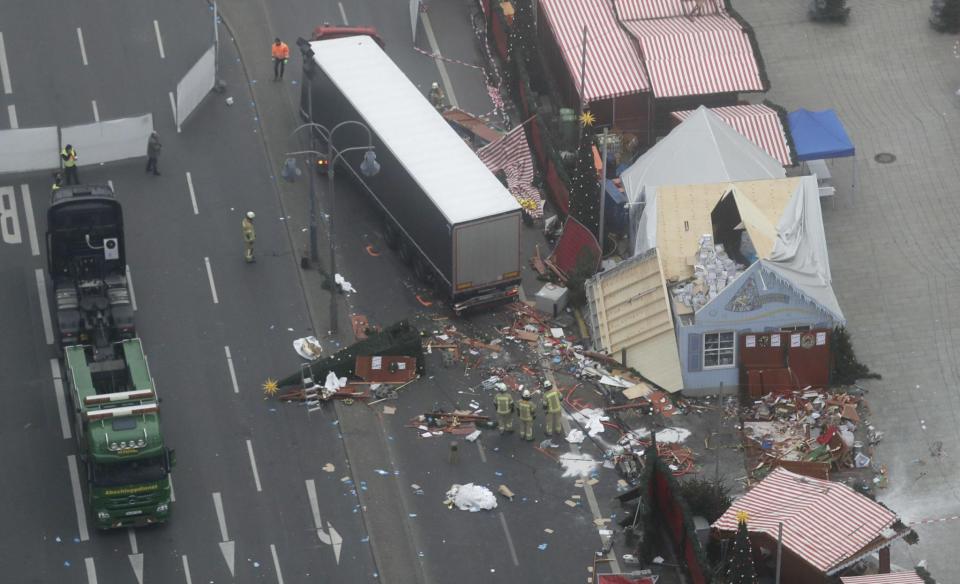 Carnage: A truck driven intentionally into a Berlin Christmas market killed 12 people in December (Markus Schreiber/AP)