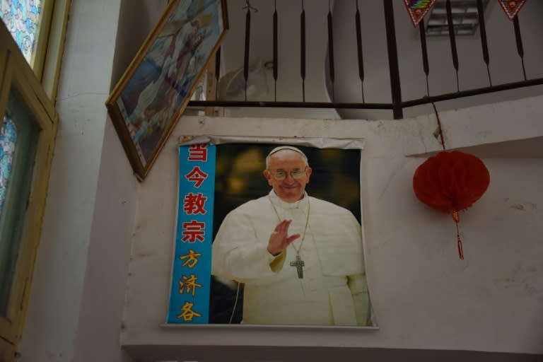 A poster of the pope in a church in China, where some there has been a recent clampdown on Catholic material