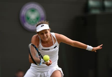 Britain Tennis - Wimbledon - All England Lawn Tennis & Croquet Club, Wimbledon, England - 30/6/16 Slovakia's Jana Cepelova in action against Spain's Garbine Muguruza REUTERS/Tony O'Brien