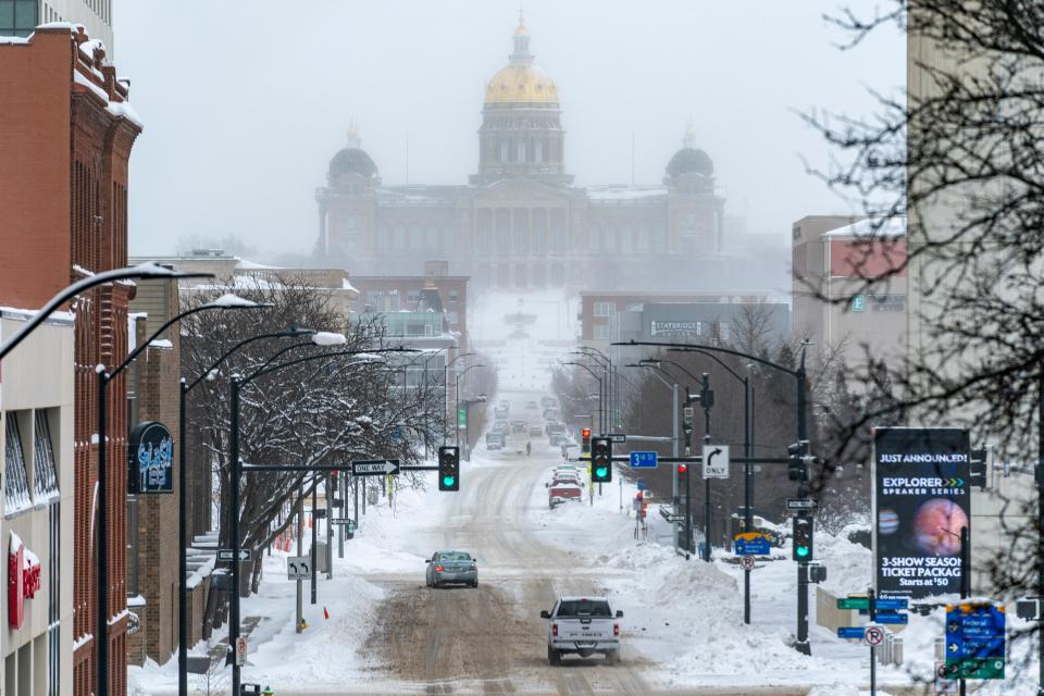 The Iowa State Capitol Building is seen in the distance in Des Moines, Iowa, Saturday, Jan. 13, 2024. Republicans are holding many events and voters are braving the cold for the Iowa caucuses.