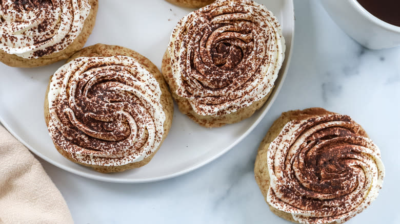 frosted cookies on white plate