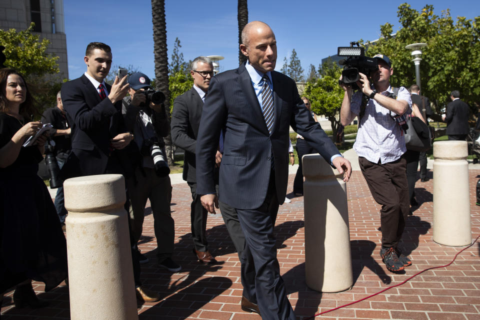 Attorney Michael Avenatti leaves federal court after a hearing Monday, April 1, 2019, in Santa Ana, Calif. Avenatti appeared in federal court on charges he fraudulently obtained $4 million in bank loans and pocketed $1.6 million that belonged to a client. (AP Photo/Jae C. Hong)